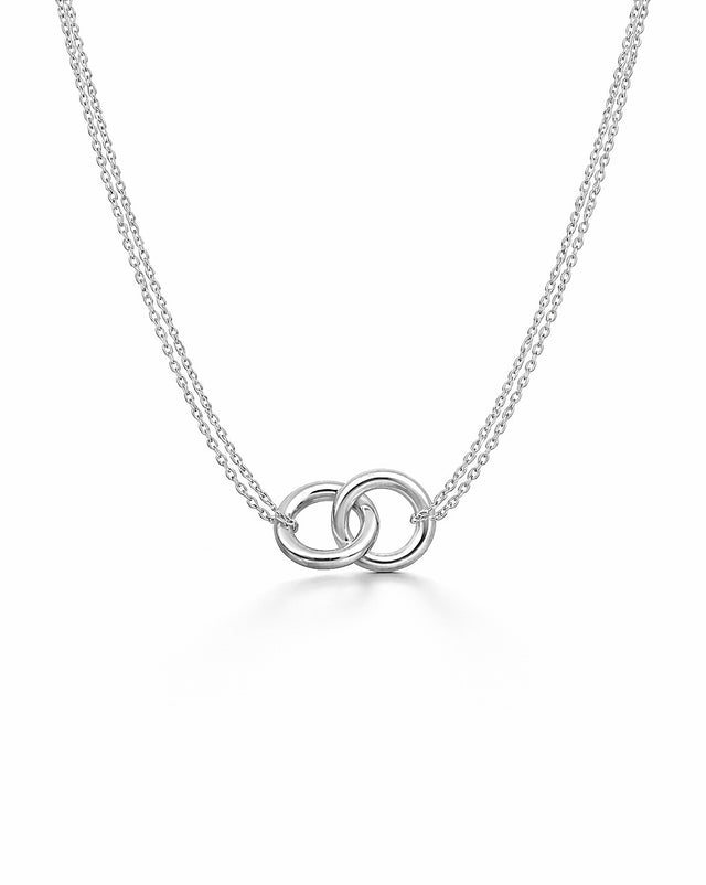 Silverhalsband till dam med två ringar i kedja. 
