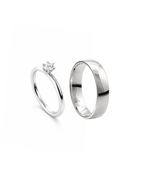 Förlovningsringar i set till dam och herr. silverring och diamantring
